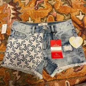 Jordache girls shorts with crochet star design.